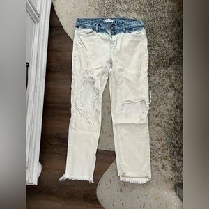 White and denim distressed jeans